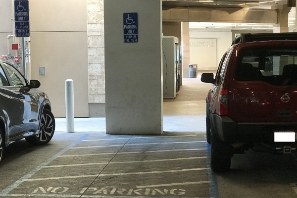 This is a handicapped parking stall that is not per ADA code requirements